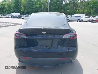 2023 Tesla Model Y Long Range with VIN 7SAYGDEE6PA166514, listed as a IAAI auction lot 41359540 with 16,271 mi miles. Bid and sale history available at carsss.com. Image 16.
