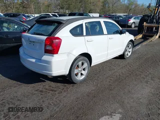 2011 Dodge Caliber Mainstreet with VIN 1B3CB3HA0BD113353, listed as a IAAI auction lot 41727663 with 116,633 mi miles and . Bid and sale history available at DreamBid. Image 4.