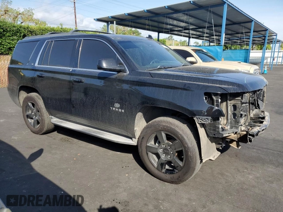 2015 Chevrolet Tahoe LT with VIN 1GNSCBKC0FR727525, listed as a Copart auction lot 53171665 with 114,689 mi miles and Salvage title. Bid and sale history available at DreamBid. Image 4.