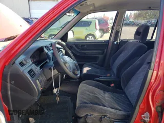 1999 Honda CR-V LX with VIN JHLRD2843XC014579, listed as a Copart auction lot 79394924 with 249,544 mi miles and Salvage Title. Bid and sale history available at carsss.com. Image 7.