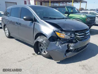 2015 Honda Odyssey LX with VIN 5FNRL5H27FB033136, listed as a IAAI auction lot 41842508 with 119,980 mi miles. Bid and sale history available at carsss.com. Image 1.