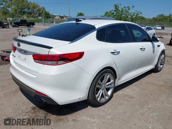 2016 Kia Optima LX with VIN KNAGT4L32G5085128, listed as a IAAI auction lot 42016728 with 259,218 mi miles. Bid and sale history available at carsss.com. Image 4.