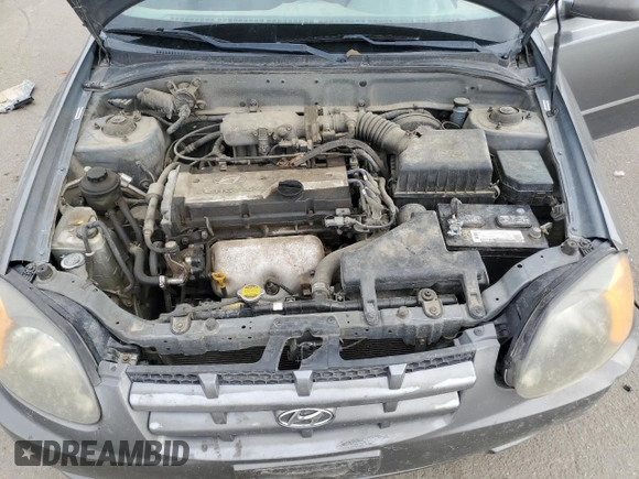2004 Hyundai Accent GL with VIN KMHCG35C34U290855, listed as a Copart auction lot 70719664 with 176,210 mi miles and Salvage Title. Bid and sale history available at carsss.com. Image 11.