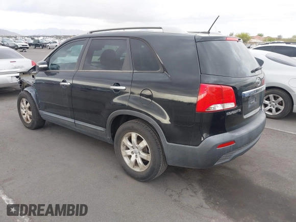 2012 Kia Sorento LX with VIN 5XYKT3A6XCG247528, listed as a IAAI auction lot 42194338 with 123,565 mi miles and . Bid and sale history available at carsss.com. Image 3.