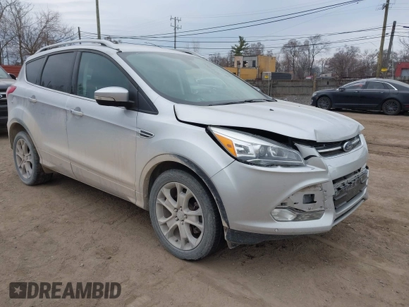 2015 Ford Escape Titanium with VIN 1FMCU9J92FUA60166, listed as a IAAI auction lot 41914080 with 103,122 mi miles and . Bid and sale history available at DreamBid. Image 1.