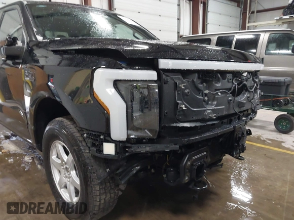2023 Ford F-150 Lightning Pro with VIN 1FTVW1EV5PWG59228, listed as a IAAI auction lot 40838790 with Not Provided miles and . Bid and sale history available at DreamBid. Image 20.