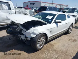 2012 Ford Mustang V6 Premium with VIN 1ZVBP8AM7C5263479, listed as a IAAI auction lot 41968713 with 148,144 mi miles. Bid and sale history available at carsss.com. Image 2.