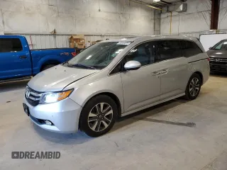 2014 Honda Odyssey Touring with VIN 5FNRL5H97EB005977, listed as a Copart auction lot 53849025 with 229,915 mi miles and Non Repairable. Bid and sale history available at DreamBid. Image 1.