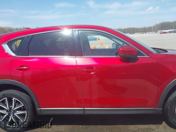 2018 Mazda CX-5 Grand Touring with VIN JM3KFBDM6J0424663, listed as a IAAI auction lot 42003207 with 95,442 mi miles and . Bid and sale history available at DreamBid. Image 13.