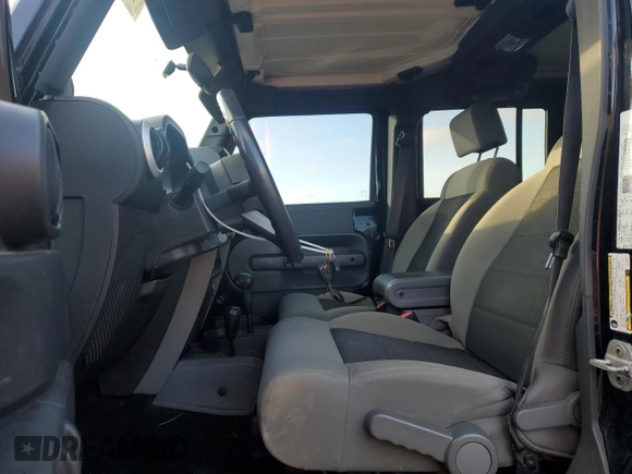 2010 Jeep Wrangler Unlimited Sahara with VIN 1J4BA5H18AL207844, listed as a Copart auction lot 48316825 with 221,599 mi miles and Clean Title. Bid and sale history available at carsss.com. Image 7.