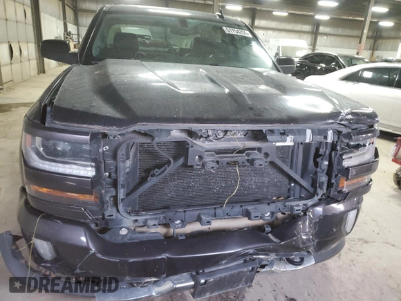2016 Chevrolet Silverado 1500 LT with VIN 3GCUKRECXGG236034, listed as a Copart auction lot 51754255 with 205,670 mi miles and Salvage Title. Bid and sale history available at DreamBid. Image 5.