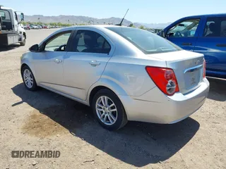2012 Chevrolet Sonic LT with VIN 1G1JC5SH1C4178839, listed as a IAAI auction lot 42142454 with 143,140 mi miles and . Bid and sale history available at DreamBid. Image 3.