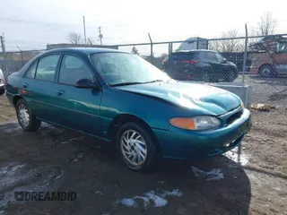 1997 Ford Escort z VIN 1FALP10PXVW410083, wystawiony jako IAAI lot #41864252 z przebiegiem 226 494 mil mil oraz . Historia ofert i sprzedaży dostępna na DreamBid. Obrazek 1.