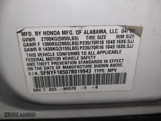 2007 Honda Pilot EX-L with VIN 5FNYF18507B019943, listed as a IAAI auction lot 41986403 with 179,379 mi miles. Bid and sale history available at carsss.com. Image 9.