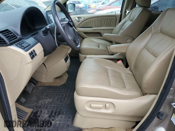 2009 Honda Odyssey Touring с VIN 5FNRL38929B048214, выставлен на аукционе Copart как лот 56735165 с пробегом 158 532 миль миль и Чистый • Clean title. История ставок и продаж доступна на DreamBid. Изображение 7.