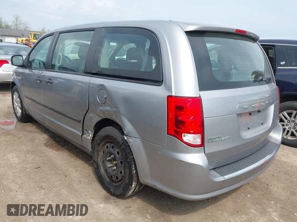 2016 Dodge Grand Caravan SE with VIN 2C4RDGBG5GR251689, listed as a IAAI auction lot 42149865 with 137,410 mi miles and . Bid and sale history available at DreamBid. Image 3.