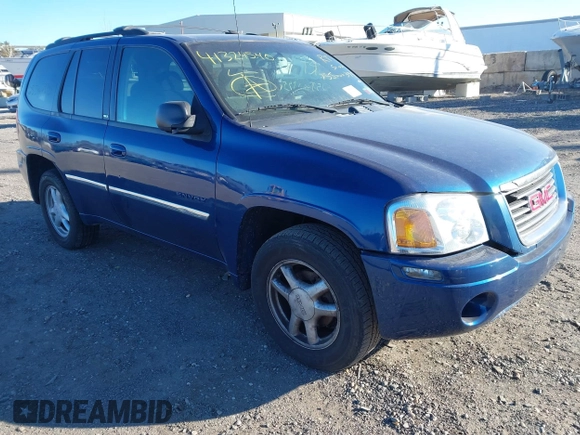 2006 GMC Envoy SLT with VIN 1GKDT13S762170322, listed as a IAAI auction lot 41324540 with 999,999 mi miles. Bid and sale history available at carsss.com. Image 1.