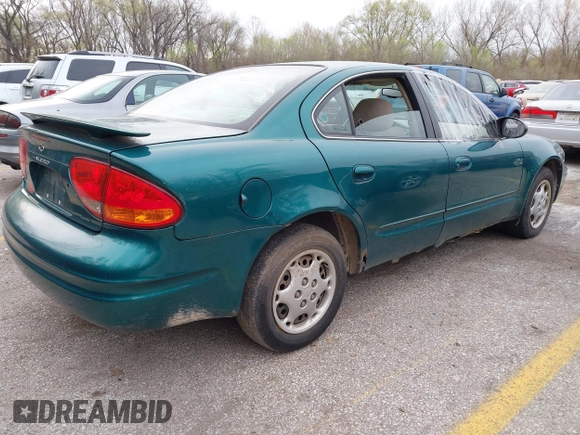 1999 Oldsmobile Alero GL z VIN 1G3NL52T7XC398799, wystawiony jako IAAI lot #41911602 z przebiegiem 252 504 mil mil oraz . Historia ofert i sprzedaży dostępna na DreamBid. Obrazek 4.