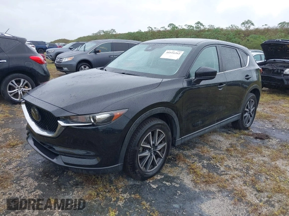 2018 Mazda CX-5 Touring with VIN JM3KFACM0J0315739, listed as a IAAI auction lot 40516262 with 60,727 mi miles. Bid and sale history available at carsss.com. Image 17.