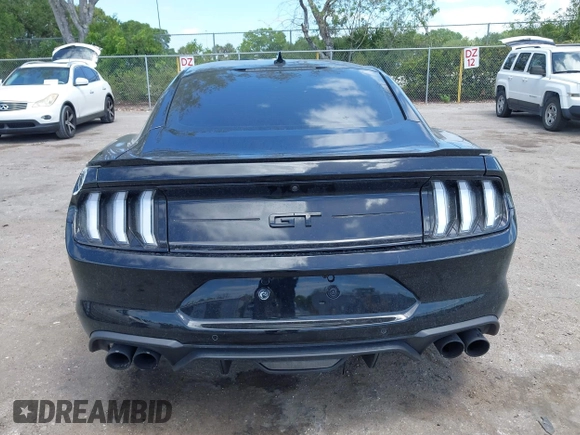 2021 Ford Mustang GT z VIN 1FA6P8CF9M5101993, wystawiony jako IAAI lot #42152731 z przebiegiem 25 699 mil mil oraz . Historia ofert i sprzedaży dostępna na DreamBid. Obrazek 16.