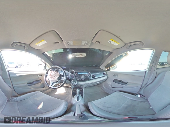 2012 Honda Insight EX z VIN JHMZE2H77CS002907, wystawiony jako Copart lot #52040465 z przebiegiem 158 266 mil mil oraz Szkoda całkowita • Salvage title. Historia ofert i sprzedaży dostępna na DreamBid. Obrazek 13.