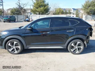 2018 Hyundai Tucson Value with VIN KM8J3CA26JU700642, listed as a IAAI auction lot 41655085 with 80,903 mi miles. Bid and sale history available at carsss.com. Image 14.