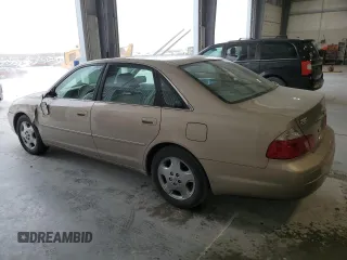 2003 Toyota Avalon XL z VIN 4T1BF28B03U280486, wystawiony jako Copart lot #57152935 z przebiegiem 131 996 mil mil oraz Szkoda całkowita • Salvage title. Historia ofert i sprzedaży dostępna na DreamBid. Obrazek 2.