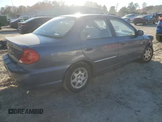 2004 Kia Spectra z VIN KNAFB121045315435, wystawiony jako Copart lot #83082084 z przebiegiem 94 974 mil mil oraz Czysty tytuł • Clean title. Historia ofert i sprzedaży dostępna na DreamBid. Obrazek 3.