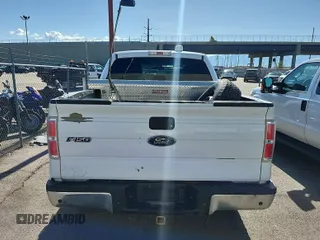 2014 Ford F-150 XL with VIN 1FTFW1ET1EKD55269, listed as a IAAI auction lot 42226627 with 214,662 mi miles and . Bid and sale history available at carsss.com. Image 28.