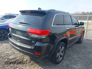2014 Jeep Grand Cherokee Overland with VIN 1C4RJECG4EC197433, listed as a IAAI auction lot 41769932 with 198,568 mi miles. Bid and sale history available at carsss.com. Image 4.