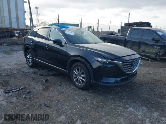2017 Mazda CX-9 Touring with VIN JM3TCBCY5H0142400, listed as a IAAI auction lot 40987166 with 118,000 mi miles. Bid and sale history available at carsss.com. Image 1.