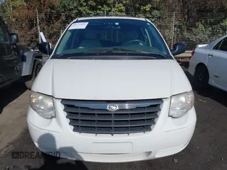 2006 Chrysler Town & Country LWB Touring with VIN 2A8GP54L56R671585, listed as a IAAI auction lot 41475419 with 166,861 mi miles. Bid and sale history available at carsss.com. Image 12.