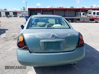 2002 Nissan Altima S z VIN 1N4AL11D22C116391, wystawiony jako IAAI lot #42263806 z przebiegiem 155 642 mil mil oraz . Historia ofert i sprzedaży dostępna na DreamBid. Obrazek 16.