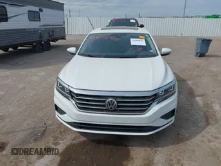 2021 Volkswagen Passat SE z VIN 1VWSA7A30MC016627, wystawiony jako IAAI lot #41904846 z przebiegiem 56 969 mil mil oraz . Historia ofert i sprzedaży dostępna na DreamBid. Obrazek 12.