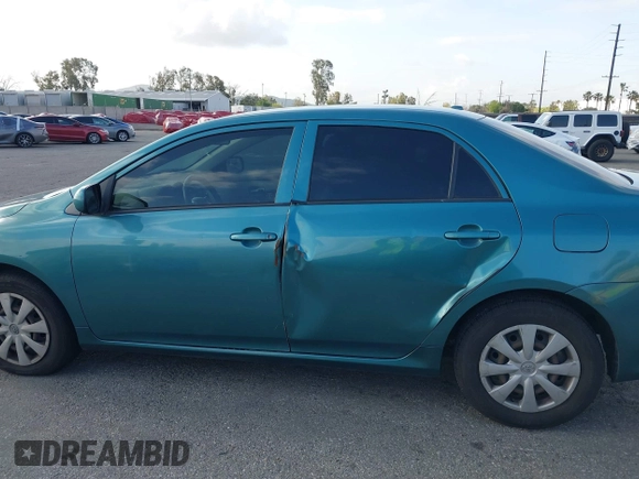 2010 Toyota Corolla with VIN JTDBU4EE4A9104965, listed as a IAAI auction lot 41956372 with 206,535 mi miles. Bid and sale history available at carsss.com. Image 6.