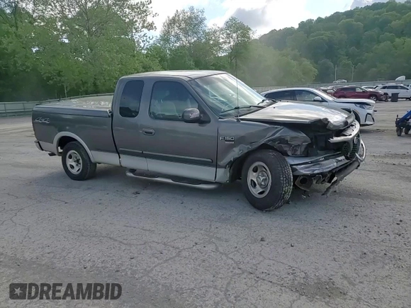 2003 Ford F-150 XL with VIN 2FTRX18L73CA49989, listed as a Copart auction lot 57434025 with 141,876 mi miles and Salvage title. Bid and sale history available at DreamBid. Image 13.