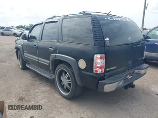 2002 Chevrolet Tahoe LT with VIN 1GNEC13Z22J335701, listed as a IAAI auction lot 42134758 with 250,668 mi miles and . Bid and sale history available at DreamBid. Image 3.