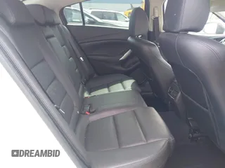 2016 Mazda Mazda6 i Touring with VIN JM1GJ1V57G1429887, listed as a IAAI auction lot 42029170 with 140,519 mi miles. Bid and sale history available at carsss.com. Image 8.