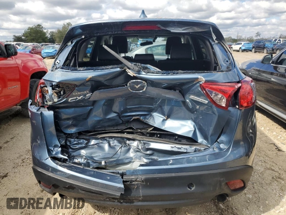 2015 Mazda CX-5 Grand Touring with VIN JM3KE2DY4F0526671, listed as a Copart auction lot 46520505 with 129,017 mi miles and Salvage Title. Bid and sale history available at carsss.com. Image 6.