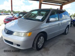 2003 Honda Odyssey EX-L z VIN 5FNRL18933B087714, wystawiony jako IAAI lot #42510813 z przebiegiem 145 360 mil mil oraz . Historia ofert i sprzedaży dostępna na DreamBid. Obrazek 2.