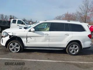 2019 Mercedes-Benz GLS 450 with VIN 4JGDF6EE3KB233297, listed as a IAAI auction lot 41882975 with 130,354 mi miles and . Bid and sale history available at DreamBid. Image 14.