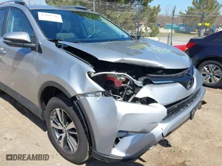 2017 Toyota RAV4 XLE with VIN 2T3RFREV1HW561295, listed as a IAAI auction lot 42049546 with 97,576 mi miles. Bid and sale history available at carsss.com. Image 6.