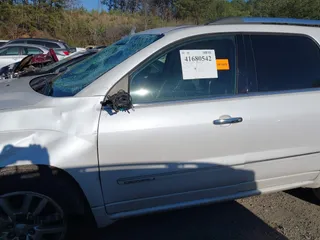 2016 GMC Acadia Denali with VIN 1GKKRTKD3GJ105785, listed as a IAAI auction lot 41680542 with 89,970 mi miles. Bid and sale history available at carsss.com. Image 14.