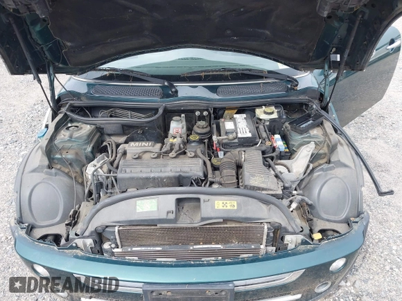 2006 MINI Hardtop with VIN WMWRC33566TK64108, listed as a IAAI auction lot 42353050 with 95,223 mi miles and . Bid and sale history available at DreamBid. Image 10.