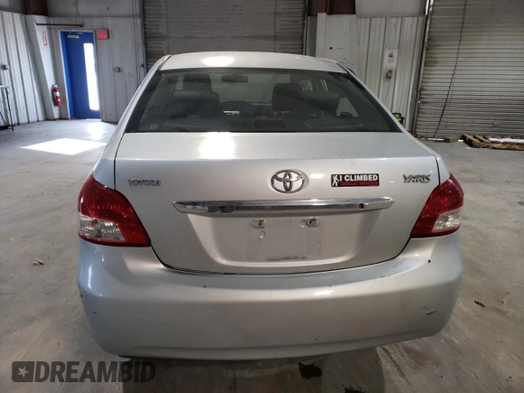 2010 Toyota Yaris with VIN JTDBT4K3XA1382385, listed as a Copart auction lot 48544795 with 169,664 mi miles and Salvage Title. Bid and sale history available at DreamBid. Image 6.