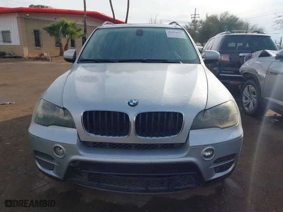 2011 BMW X5 35i with VIN 5UXZV4C5XBL407637, listed as a IAAI auction lot 41454552 with 204,510 mi miles. Bid and sale history available at carsss.com. Image 12.