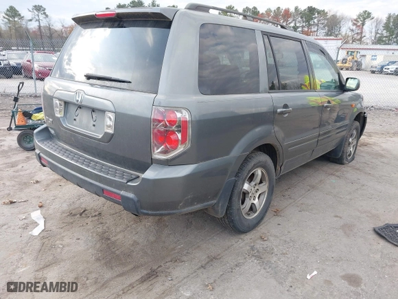 2007 Honda Pilot EX-L with VIN 5FNYF286X7B015235, listed as a IAAI auction lot 41915819 with 310,294 mi miles. Bid and sale history available at carsss.com. Image 4.
