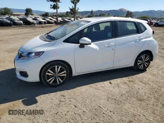 2018 Honda Fit EX with VIN 3HGGK5H8XJM704531, listed as a Copart auction lot 61823395 with 23,009 mi miles and Salvage title. Bid and sale history available at DreamBid. Image 1.
