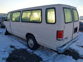 2010 Ford Econoline Wagon XL with VIN 1FBSS3BL9ADA55363, listed as a IAAI auction lot 41179750 with 127,918 mi miles. Bid and sale history available at carsss.com. Image 3.