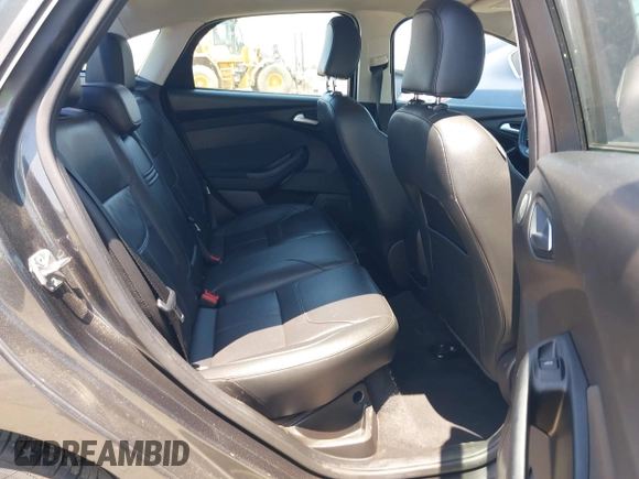 2016 Ford Focus SE z VIN 1FADP3F25GL329217, wystawiony jako IAAI lot #42461772 z przebiegiem 85 070 mil mil oraz . Historia ofert i sprzedaży dostępna na DreamBid. Obrazek 8.